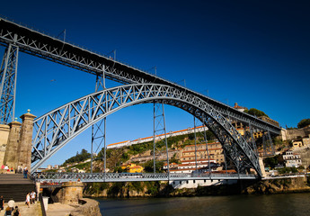 Fototapeta na wymiar A wide angle shot of the Ponte Dom Luis I bridge in Porto - Oporto- Portugal