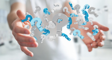 Businessman using 3D rendering question marks