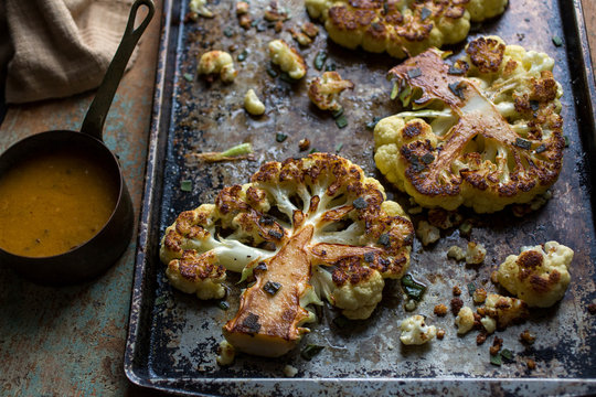 Roasted cauliflower steaks on sheet pan