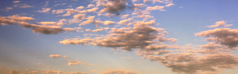Naklejka na ściany i meble blue sky background with clouds at sunset