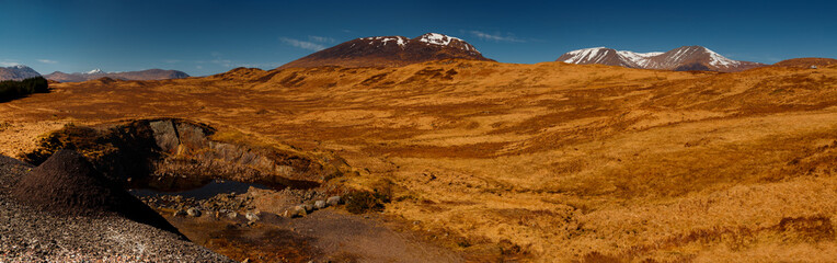 Panoramic shot of the Scottish Highlands, United Kingdom on a sunny day