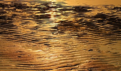 Sandstrand am Abend bei Ebbe