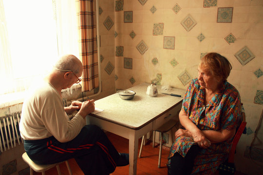 poverty old couple in the kitchen