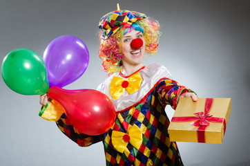 Funny clown in comical concept