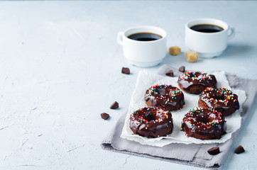 Baked chocolate doughnuts with chocolate glaze