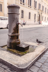 Classic Roman water fountains located  old city of Rome, Italy Nasone,  Fontanella,