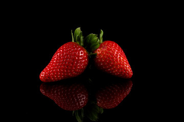 Red ripe strawberry fruits