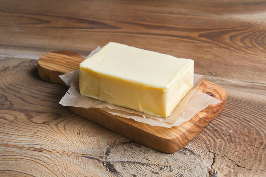 Butter on wooden board