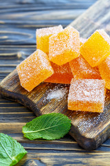 Cubes of orange marmalade.