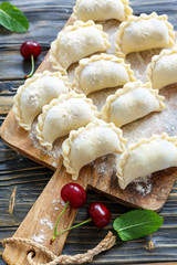 Cooking dumplings with cherries.