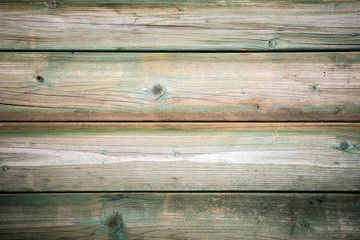 Grunge background of old green wooden plank. Horizontal stripes