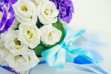 Wedding floristry, The bride is holding a bouquet, the bride's bouquet, Bride with bouquet, wedding day