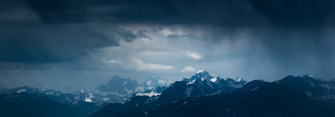 Mountain landscape before storm. Mounts Sofiya and Karakaya. Caucasus Mountains.
