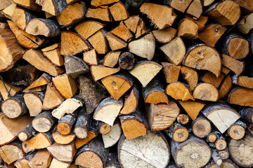 Sawn and chopped wood in a stacked in stack