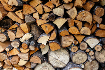 Sawn and chopped wood in a stacked in stack