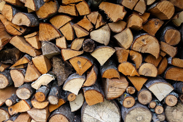 Sawn and chopped wood in a stacked in stack