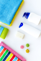Bathroom set. Towels and bottles with soap and shampoo on white backgrond top view