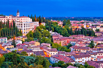 Fototapeta na wymiar Verona rooftops and Opera Don Calabria evening view