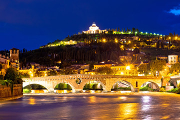 Madonna di Lourdes sanctuary and Adige river in Verona evening view