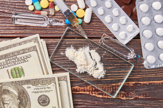 Illegal drug trafficking, narcotic preparations. Money of junkie for heroin sale.