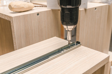 Assembling of furniture closeup