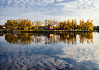 Sky and water. Full reflection.