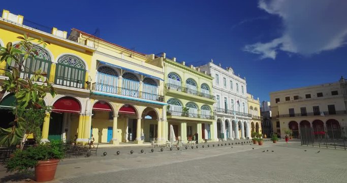 A daytime morning establishing shot of Havana's Old Town Square.  	