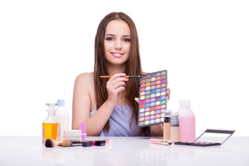 Young woman in beauty make-up isolated on white