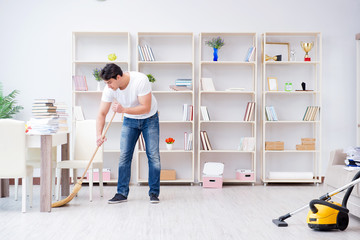 Man doing cleaning at home