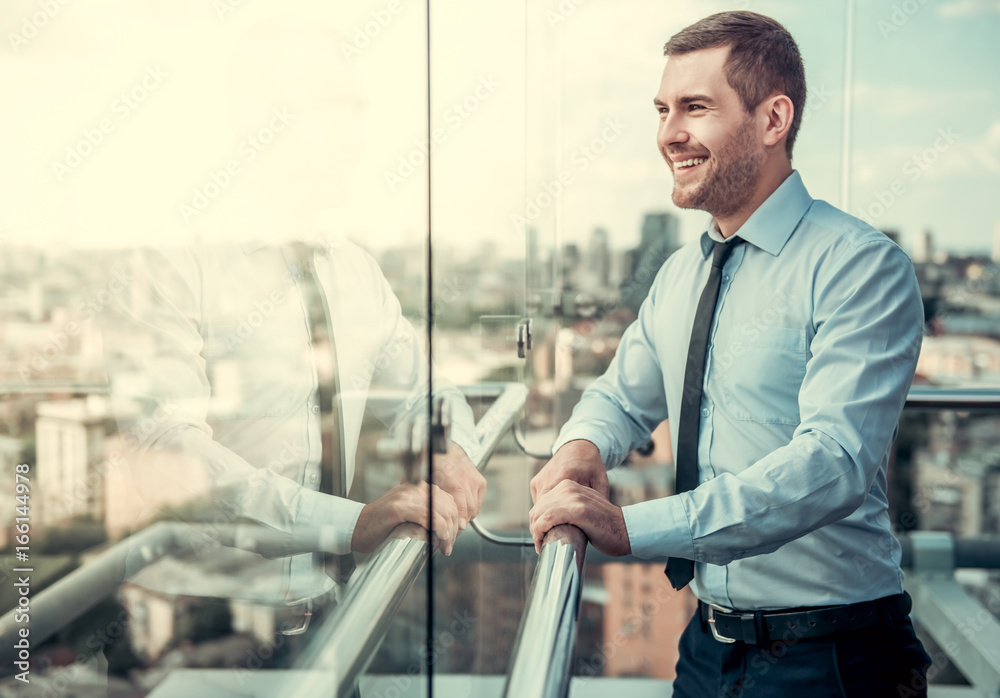 Wall mural Businessman during break