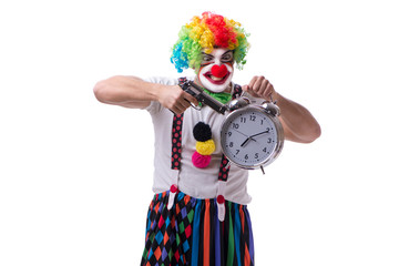 Funny clown with an alarm clock isolated on white background