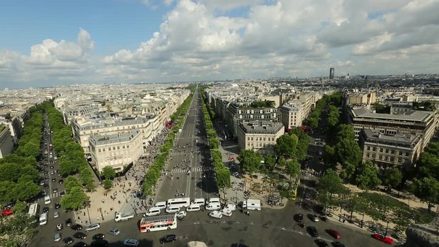 Paris skyline aerial view from top of Arc de Triomphe on Champs Elysees street. Distant Tour Eiffel tower Landmark in Paris, France, Europe.