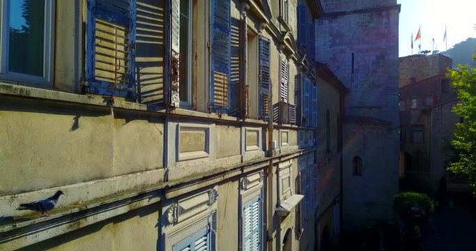 Old Town Grasse and Cathedral Notre-Dame du Puy. Traditional French architecture : shuttered windows. Provence, Alpes-Maritimes