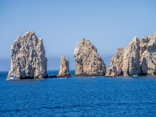 Fototapeta na wymiar Lands End in Cabo San Lucas in Baja California, Mexico, where the Pacific Ocean meets the Sea of Cortez. Viewed from the Sea of Cortez.