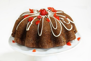 Fototapeta na wymiar Chocolate Cherry Bundt Cake isolated on white