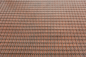 Old red tile roof background texture