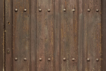 Fototapeta premium Old wooden door with metal elements