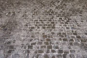 Old grey stone pavement background