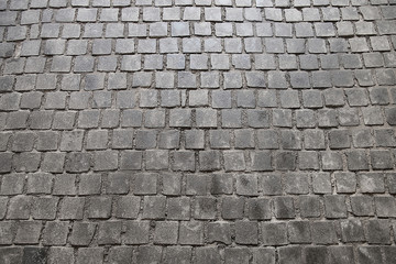 Old grey stone pavement background