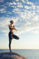 caucasian fitness woman practicing yoga - 166152527