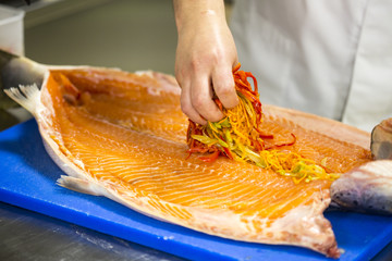 Salmon stuffed with vegetables and spices