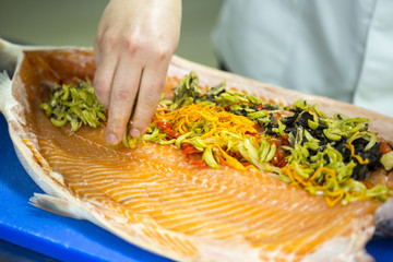 Salmon stuffed with vegetables and spices