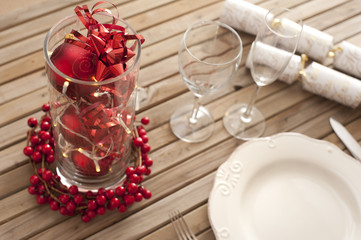 Christmas table setting with red decorations