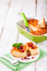 Cottage cheese casserole on a light background. Selective focus. Copy space