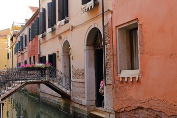 colorful houses and canal in Venice, Italy