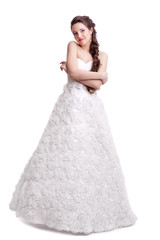 Fototapeta na wymiar Portrait of beautiful young brunette woman bride in white Wedding Dress