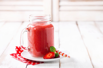 Berry drink. Strawberry smoothie. Berry milkshake. Selective focus. Copy space.