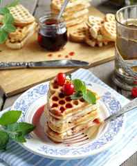 Waffles with cherry jam