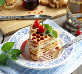 Waffles with cherry jam
