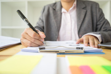 business people discussing document in meeting room